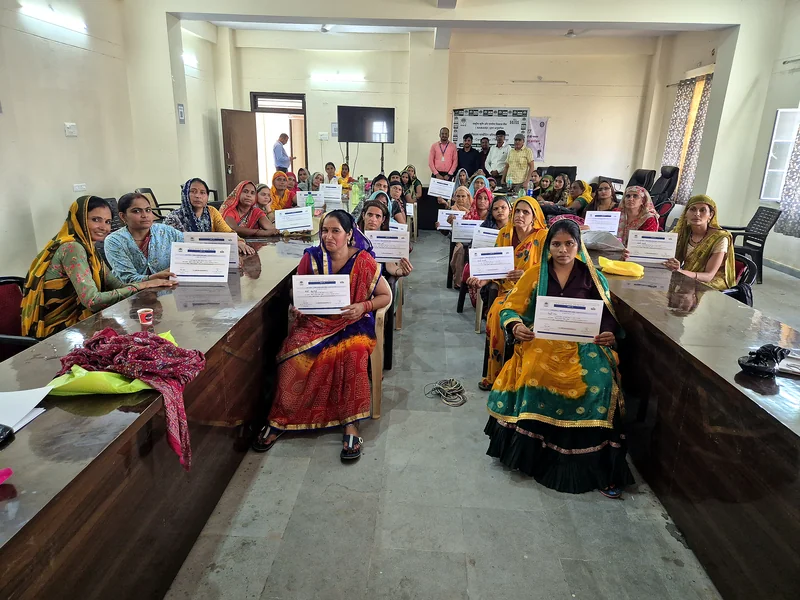 Certificate distribution to women participants at the close of the NABARD digital training at Uchchain, Bharatpur.